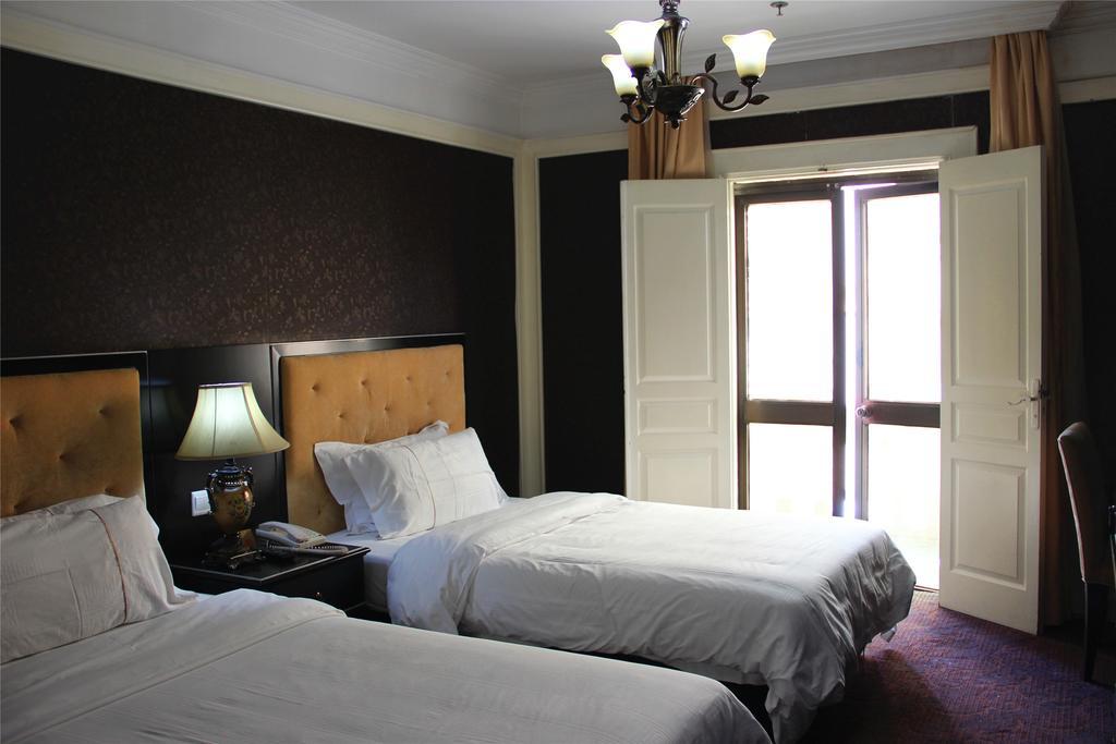 Manhattan Jinling Hotel Shanghai Værelse billede
