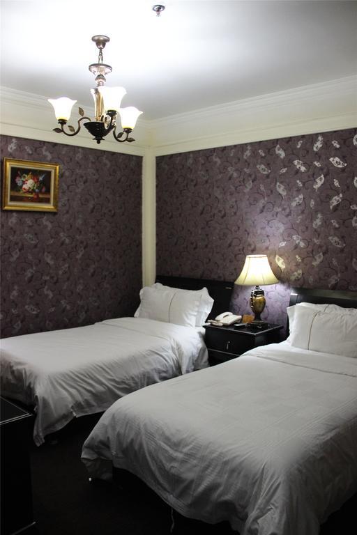 Manhattan Jinling Hotel Shanghai Værelse billede