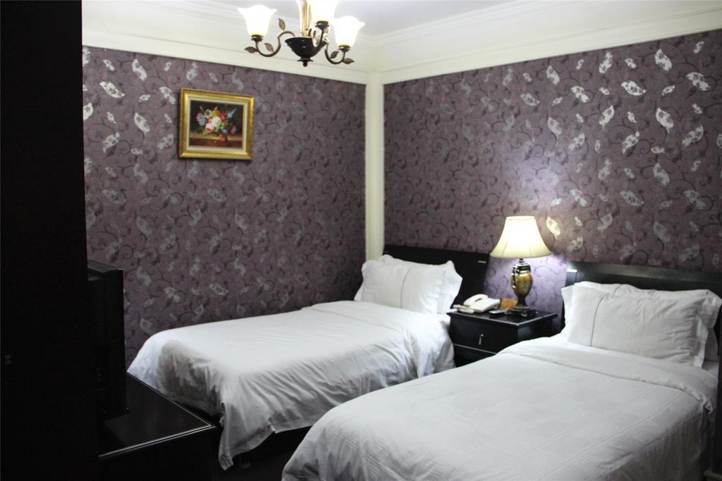 Manhattan Jinling Hotel Shanghai Værelse billede
